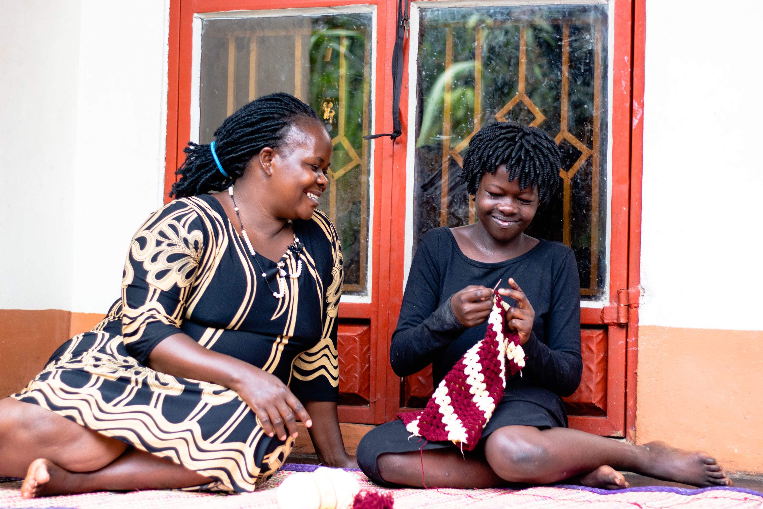 Ugandan social worker and young woman